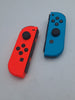 Nintendo switch 32GB handheld console with red/blue joy cons, dock and charger UNBOXED