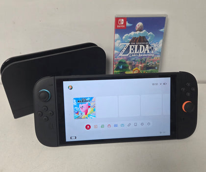 Nintendo Switch 2 Console with one boxed and 0ne unboxed game
