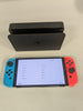 Nintendo Switch – OLED Model w/ Neon Red & Neon Blue Joy-Con