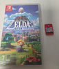 Nintendo Switch 2 Console with one boxed and 0ne unboxed game