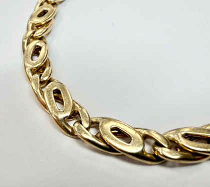 9ct yellow gold fancy link bracelet with an interlocking oval and loop design 8