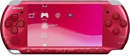 Sony PSP handheld console with charger and case