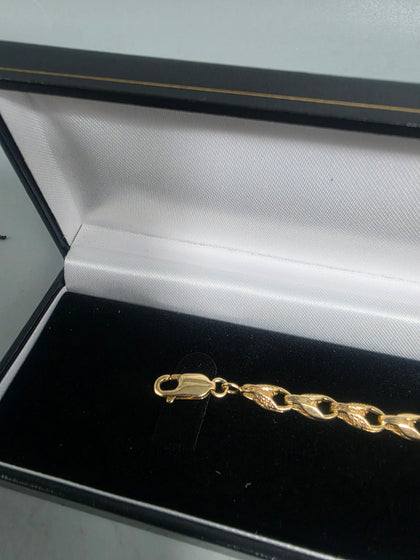 10.3G 9ct gold bracelet child's, 375 6