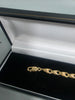 10.3G 9ct gold bracelet child's, 375 6"