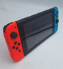 Nintendo switch 32GB handheld console with red/blue joy cons, dock and charger UNBOXED