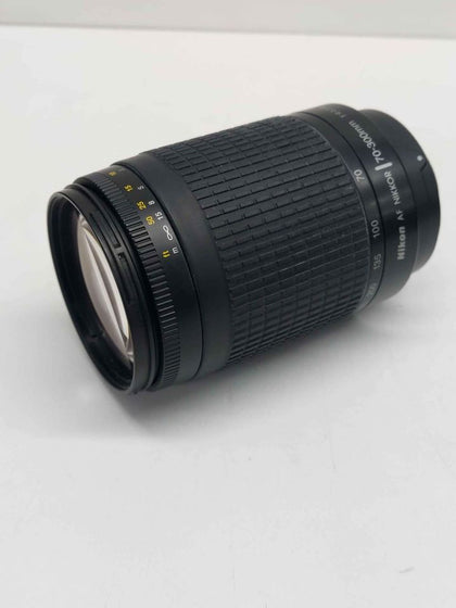 NIKON AF Nikkor 70 - 300 mm f4-5.6 G lens with hood but no caps small scratch on front edge element.