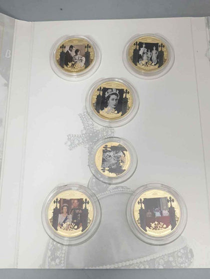 London Mint Her Majesty Queen Elizabeth A Life In Pictures Proof Coin Set 9CT Coin Included.