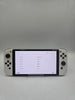 Nintendo Switch OLED boxed with charging dock
