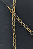 9CT 375 HALLMARKED, YELLOW GOLD, MARQUISE PENDANT ON OVAL LINK CHAIN, 20", 5.28G