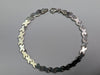 9ct white gold flat x bracelet