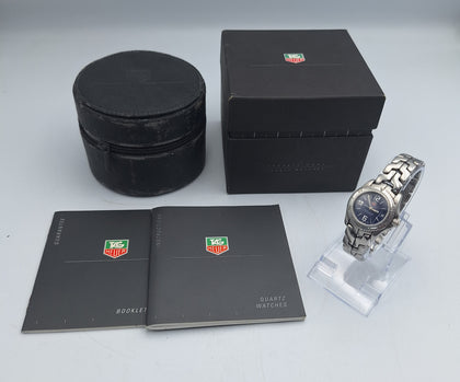 Tag Heuer link blue womens quartz stainless steel watch with papers and box, includes original recipt of purchase.
