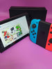 Nintendo Switch console 32GB + Neon Red/Blue Joy-Cons, Dock And Comfort Grip
