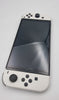 Nintendo Switch OLED 64GB white/black handheld console with hdmi dock. Original charger and joy-con cradle. Comes with carry case