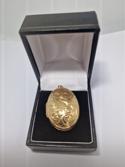 Gold Locket 9CT 3.9G has a very slight dent on the back please see picture.