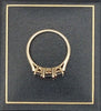 9ct 375 yellow gold ring with dark purple stones 2.58g Boxed size O