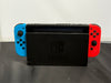 nintendo switch console red and blue joycons