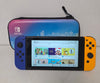Nintendo Switch -Neon Purple & Yellow Console with 2 unboxed Pokemon games