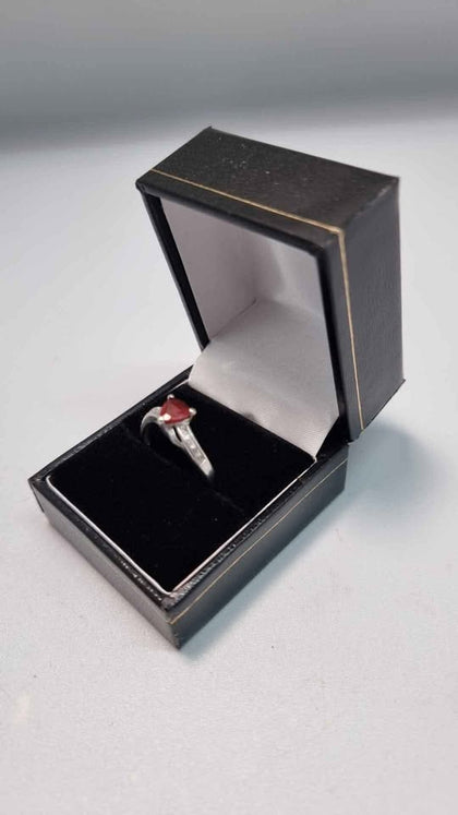 9ct White Gold Ring With Red Triangle Stone - Size R - 2.47 Grams