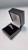 9ct White Gold Ring With Red Triangle Stone - Size R - 2.47 Grams