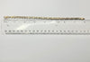 9ct yellow gold fancy link bracelet with an interlocking oval and loop design 8"