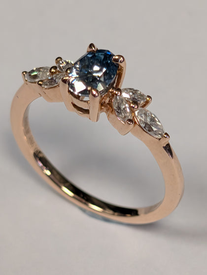 9ct rose gold ring with sea blue stone