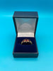 9ct gold ring with red stones (S)
