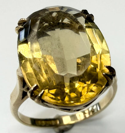 9ct gold dress ring with large yellow stone