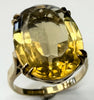9ct gold dress ring with large yellow stone