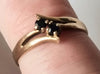 9CT GOLD RING WITH DARK BLUE STONES - Size N