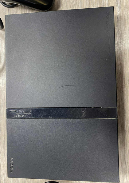 * Playstation 2 Slim - Comes with the pad