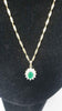 9CT GOLD CHAIN WITH 9CT GREEN STONE PENDANT