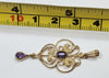 9ct Gold Pendant with Purple Stones
