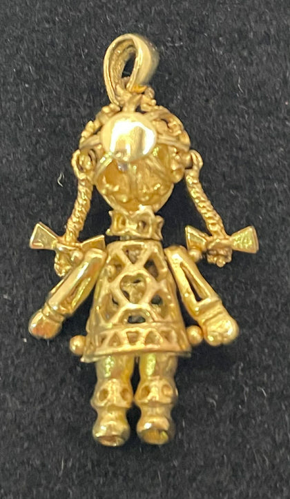 Gold pendent doll