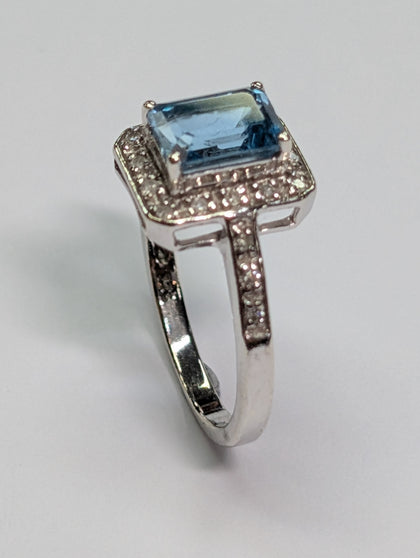 9CT WHITE GOLD DIAMOND & BLUE STONE RING