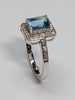 9CT WHITE GOLD DIAMOND & BLUE STONE RING