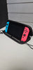 Nintendo Switch Console, 32GB + Neon Red/Blue Joy-Con