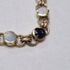 9CT GOLD BRACELET  WITH BLACK/SILVER COLOURED STONE PRESTON STORE