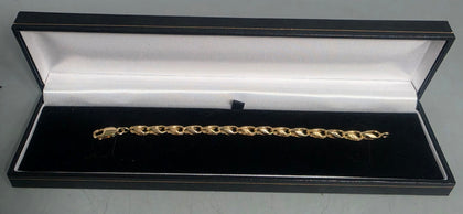 10.3G 9ct gold bracelet child's, 375 6