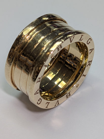 Heavy 14ct gold puzzle style ring