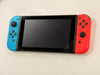 nintendo switch console red and blue joycons