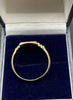 Gold ring star with small stone
