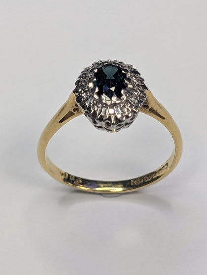 18ct gold diamond & black stone ring