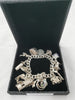 Silver Bracelet with 14 Charms (925 Hallmarked), 58.53Grams, Box Included, Approx., 8" Length