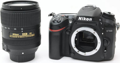 nikon d7100 with tamron 16-300mm lense and flash