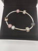 Pandora Bracelet with 6 charms and rose plated heart clasp Hallmarked(ALE) and Boxed