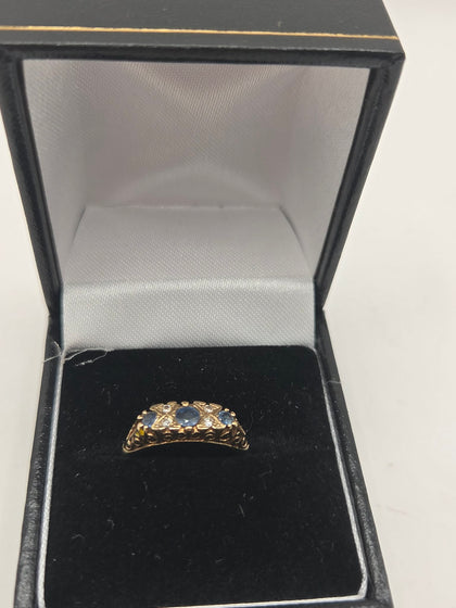 Hallmarked 9k Gold Womens Ring with blue stones , size M -3.1 grams