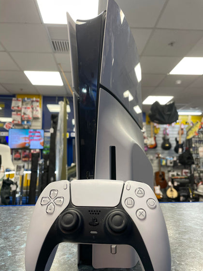 Playstation 5 slim with controller.