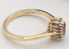 9CT HALLMARKED 375, YELLOW GOLD, RING WITH RED STONE EMBEDDED, SIZE I, 1.6G, BOXED