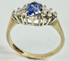 9ct yellow cluster ring with blue stone K 1/2