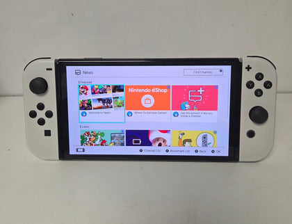 Nintendo Switch Oled white Console with 128gb memory card And 1 unboxed game